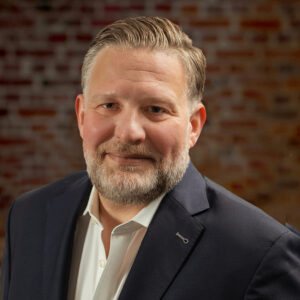 Das Bild zeigt TBF Senior Fondsmanager Sebastian Schütt in Portraitaufnahme