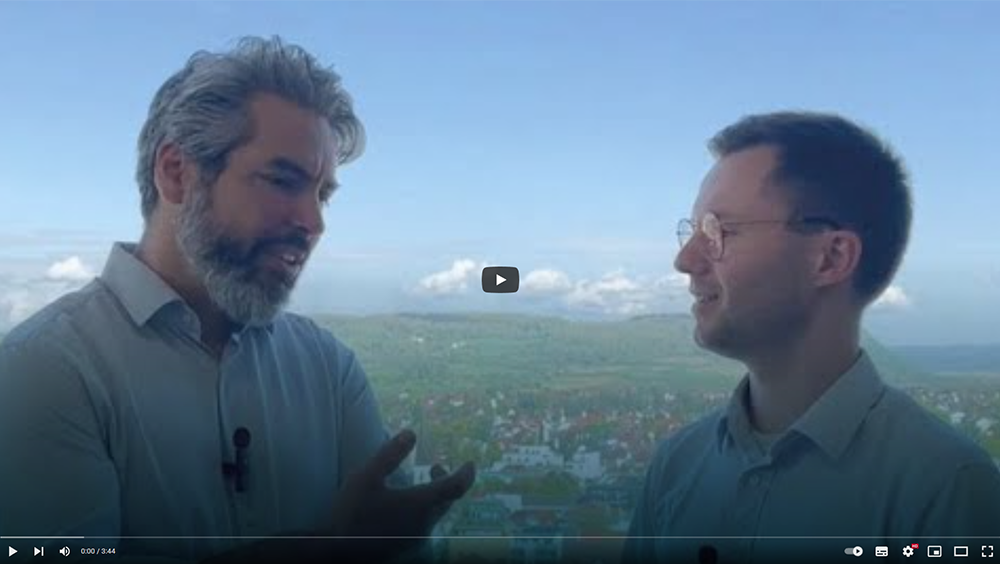 TBF Let's talk about finance. Das Bild zeigt Patrick Vogel und Maximilian Dreide im Gespräch.