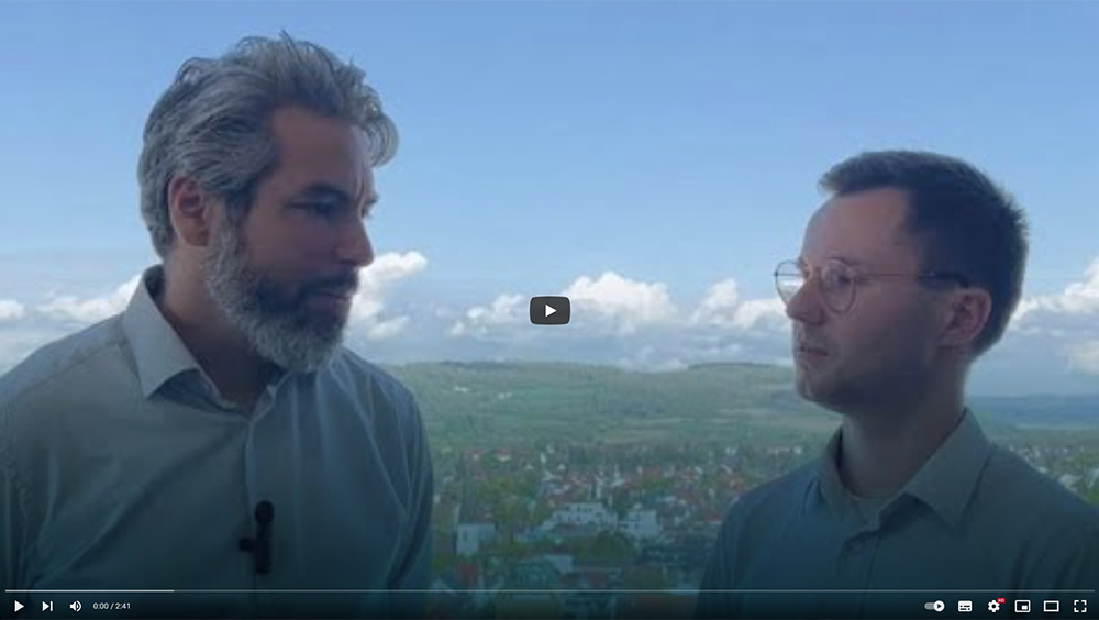 TBF Let's talk about finance. Das Bild zeigt Patrick Vogel und Maximilian Dreide im Gespräch.